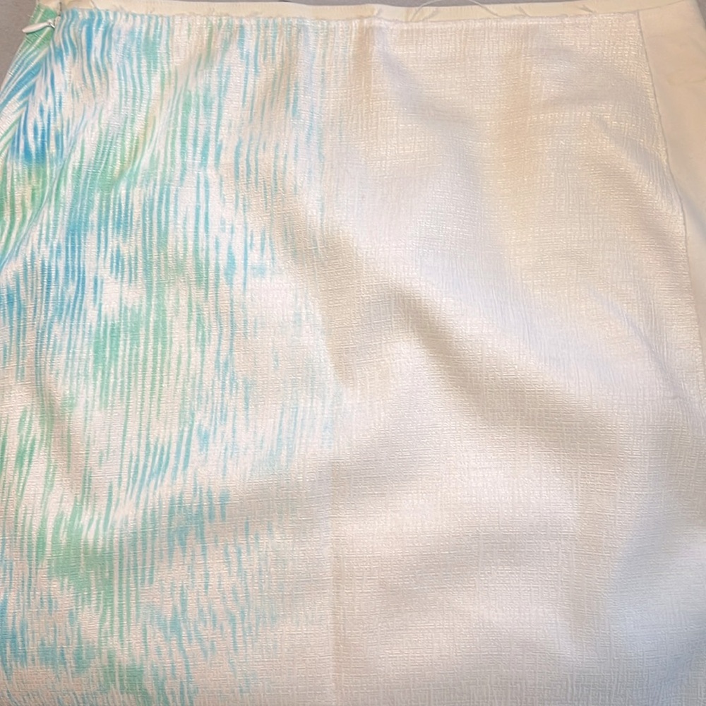 Tahari white skirt with green and blue design, lining, and side zipper